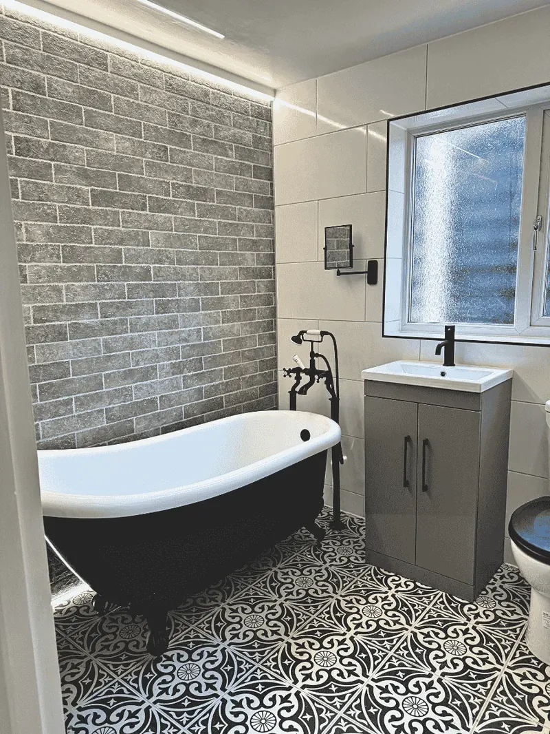 High-end full bathroom renovation in Kettering — premium electrical finish and LED feature lighting by Entigen