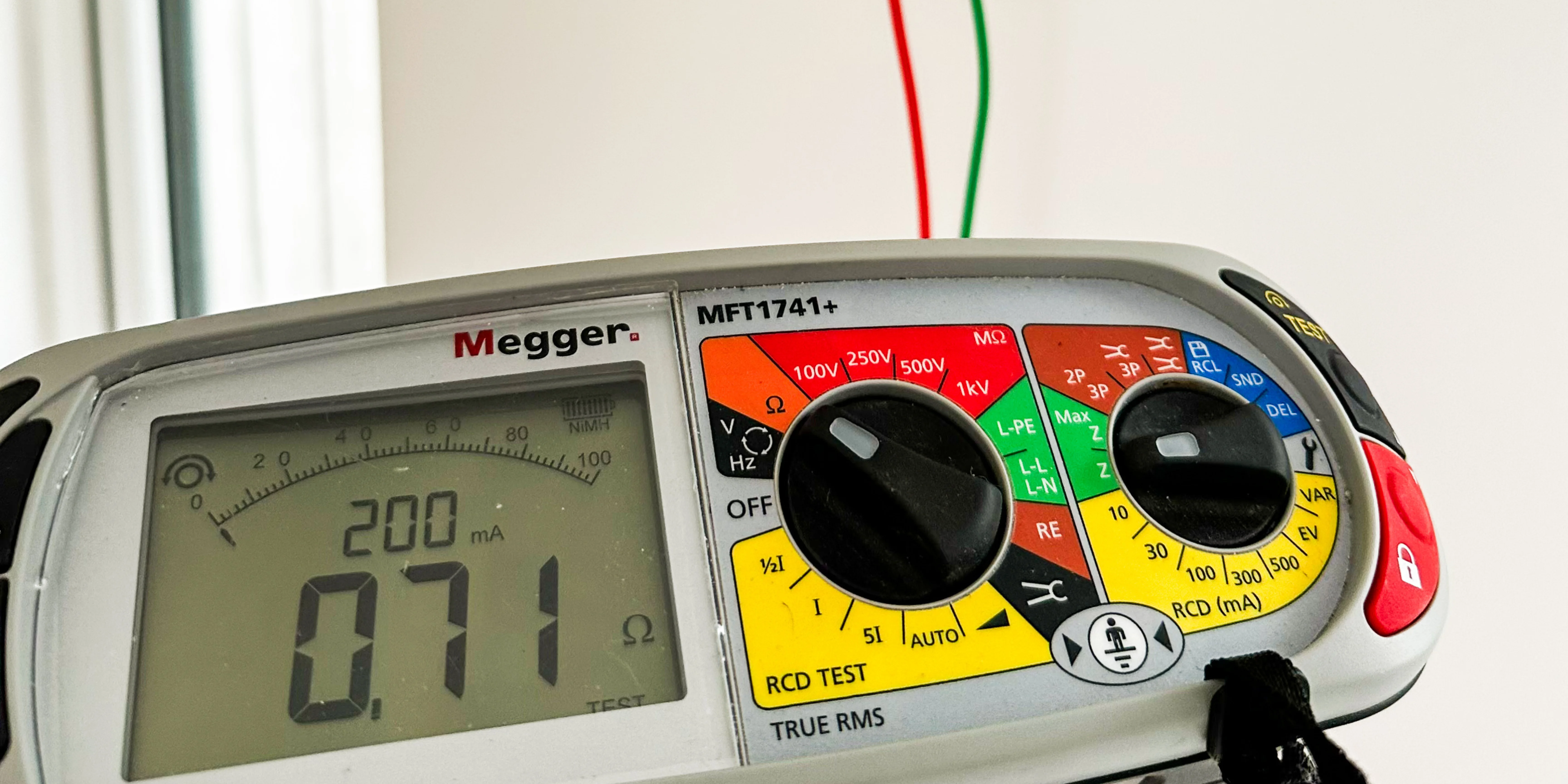 NAPIT electrician carrying out EICR electrical safety testing in Kettering